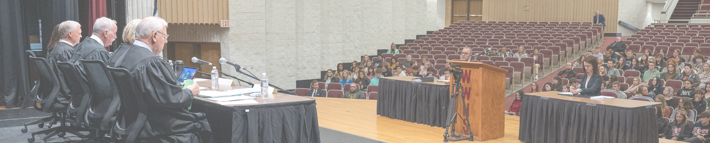 Image of Supreme Court Justices at the desk