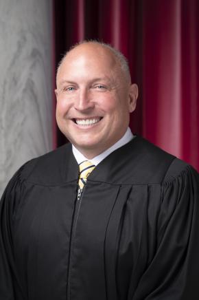 justiceFlaniganHeadshot